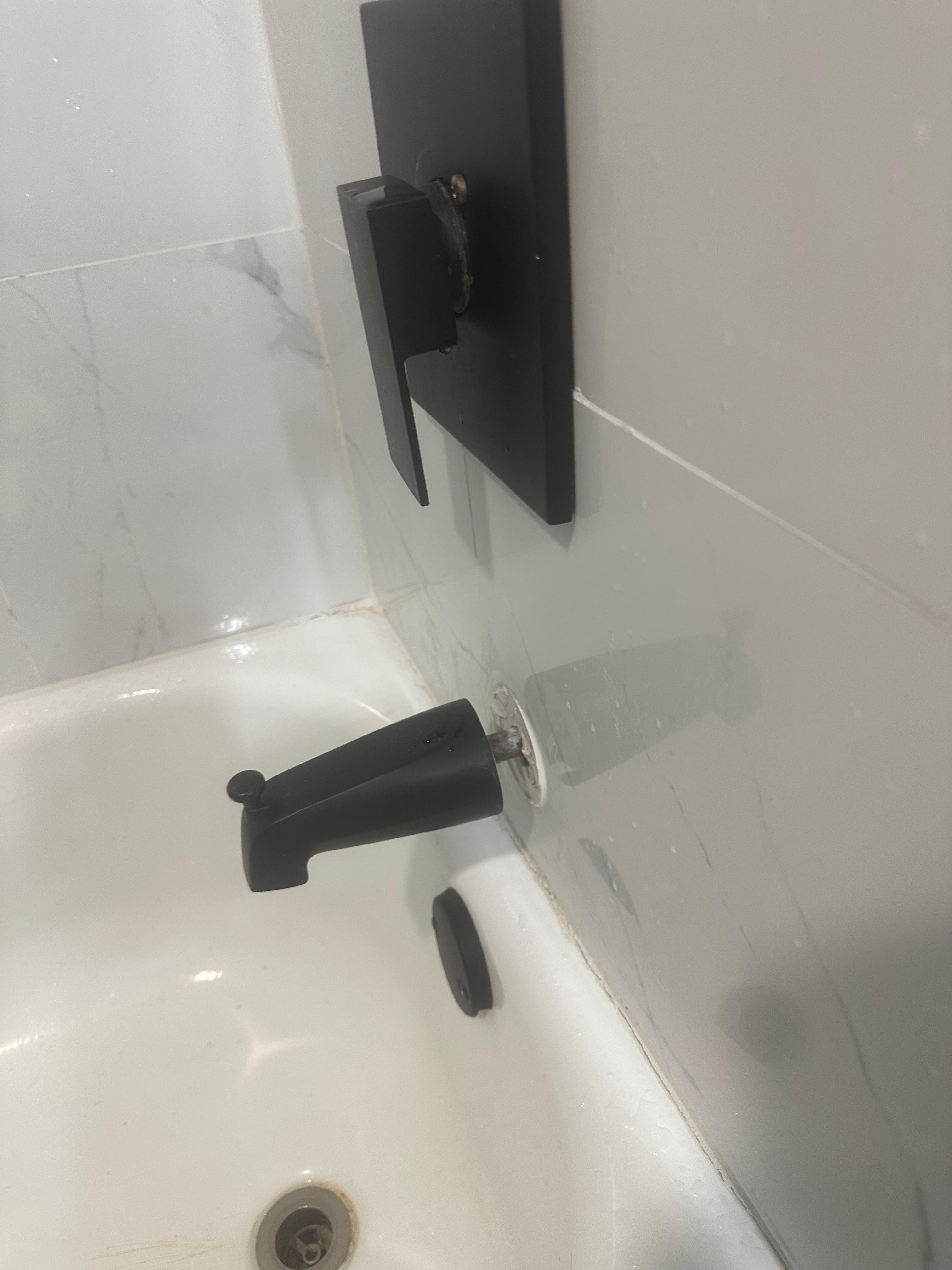 Tub spout not flush to wall. 