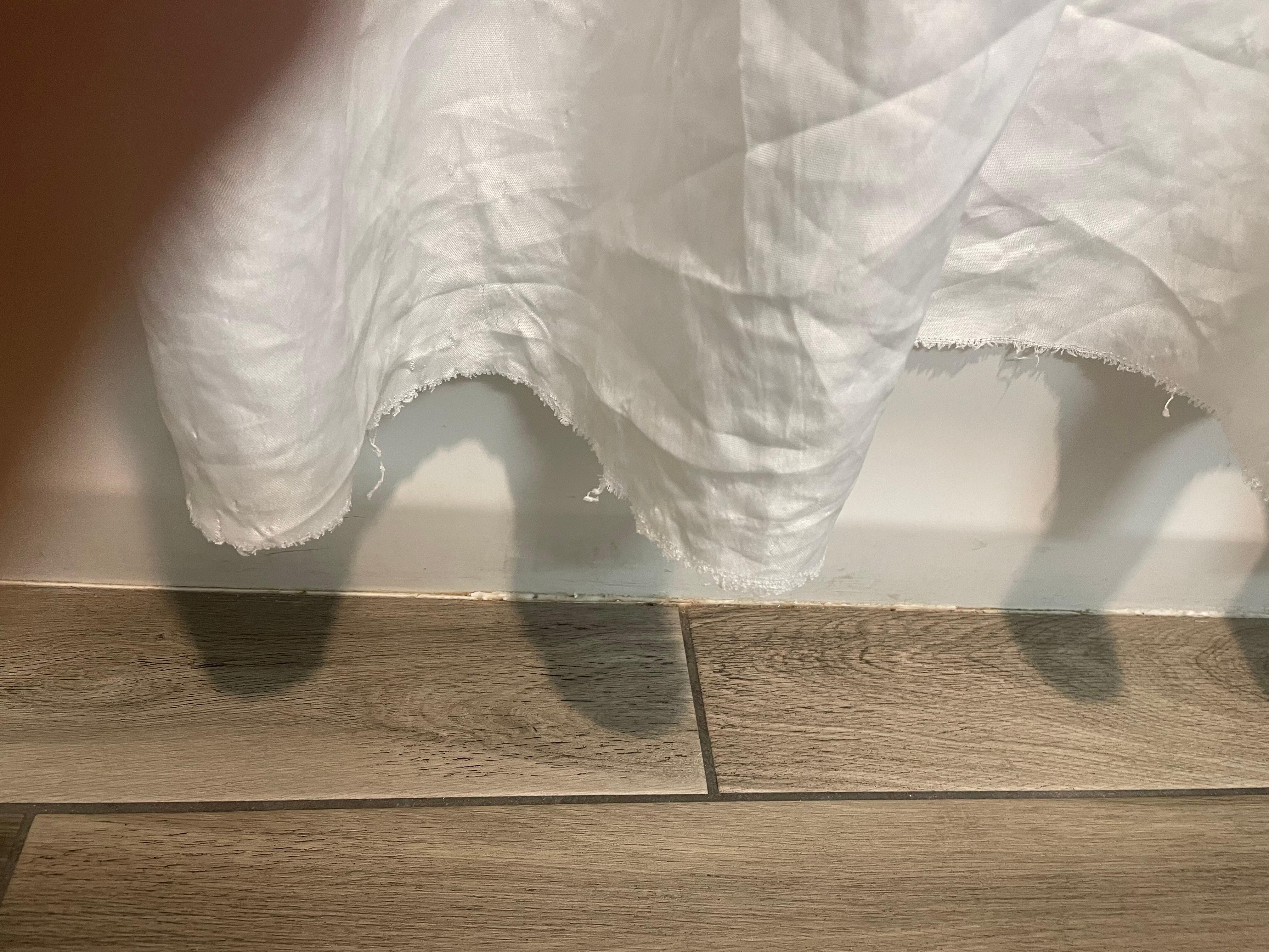 Shower curtain is shredded