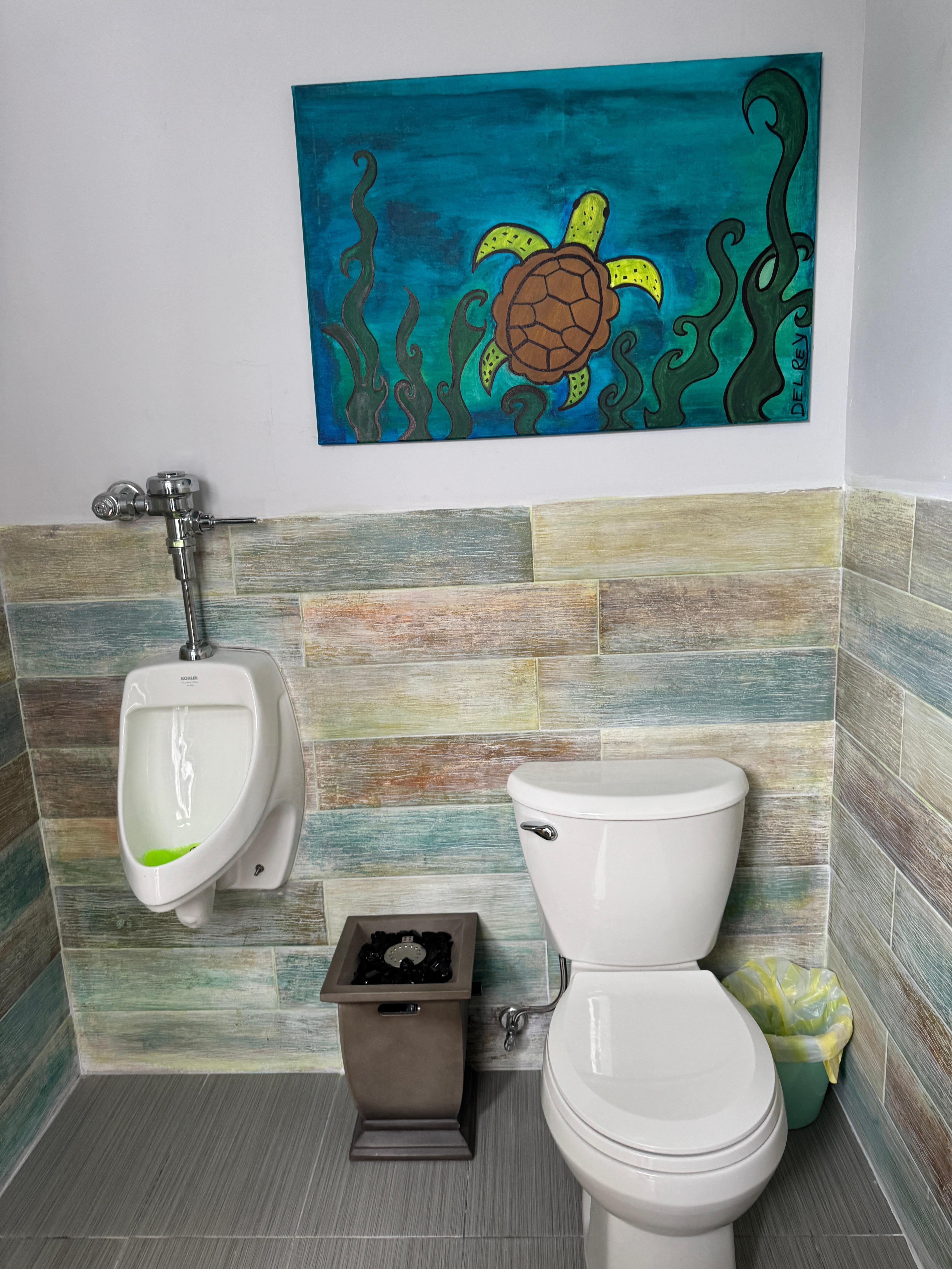 Pool area has an outdoor bathroom for use