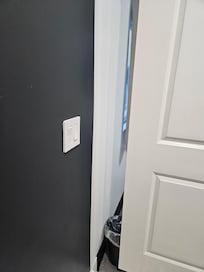 Bathroom door does not completely close . Anyone walking through alley can see you in the bathroom.