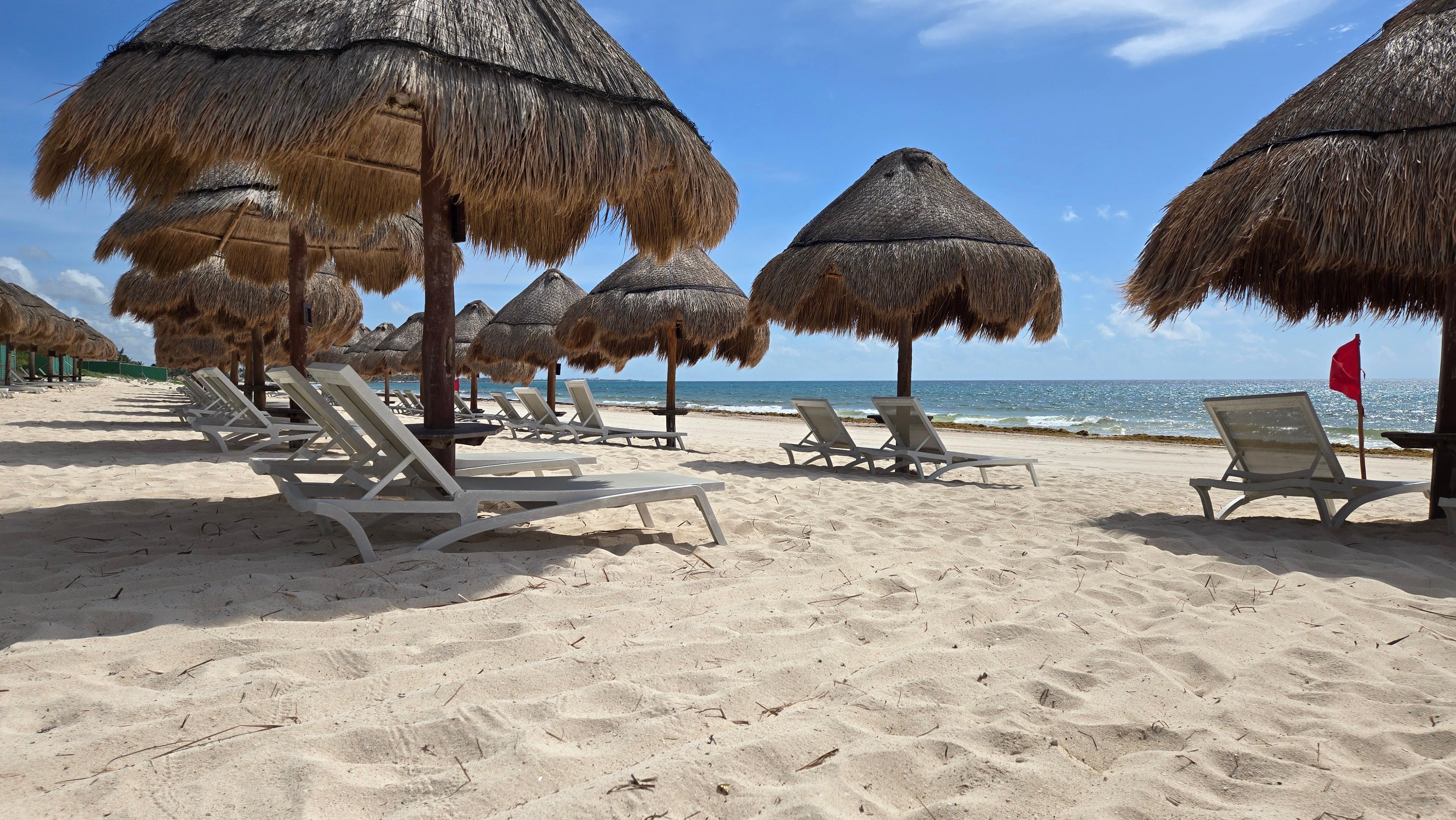 The beach...so what- there's seaweed. The water was divine, and the service is impeccable.
