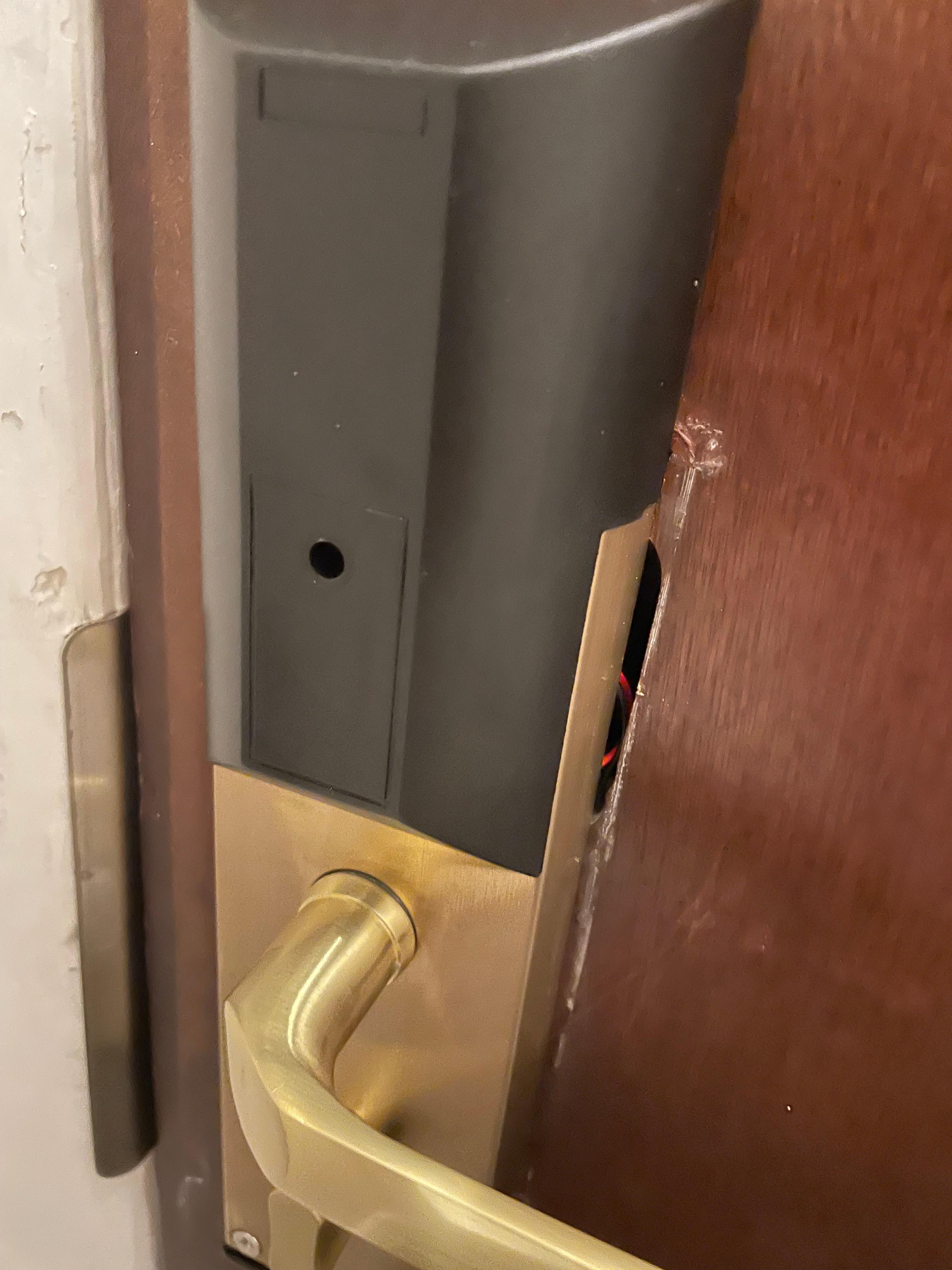Lock almost falling off with exposed wires