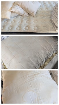 Mattress with no protective cover and stained pillows that also had no protective covers