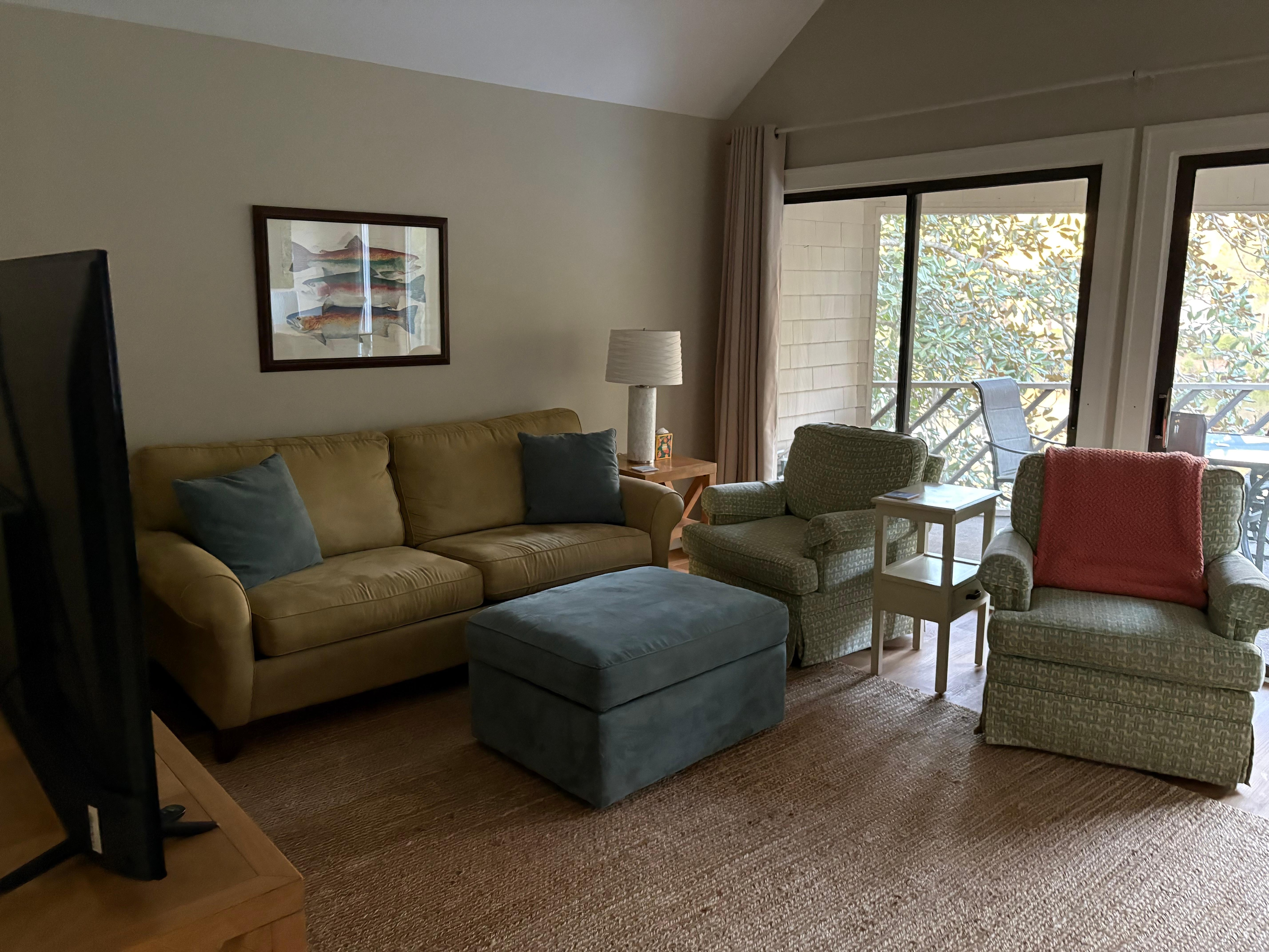 Living room with tv and games.