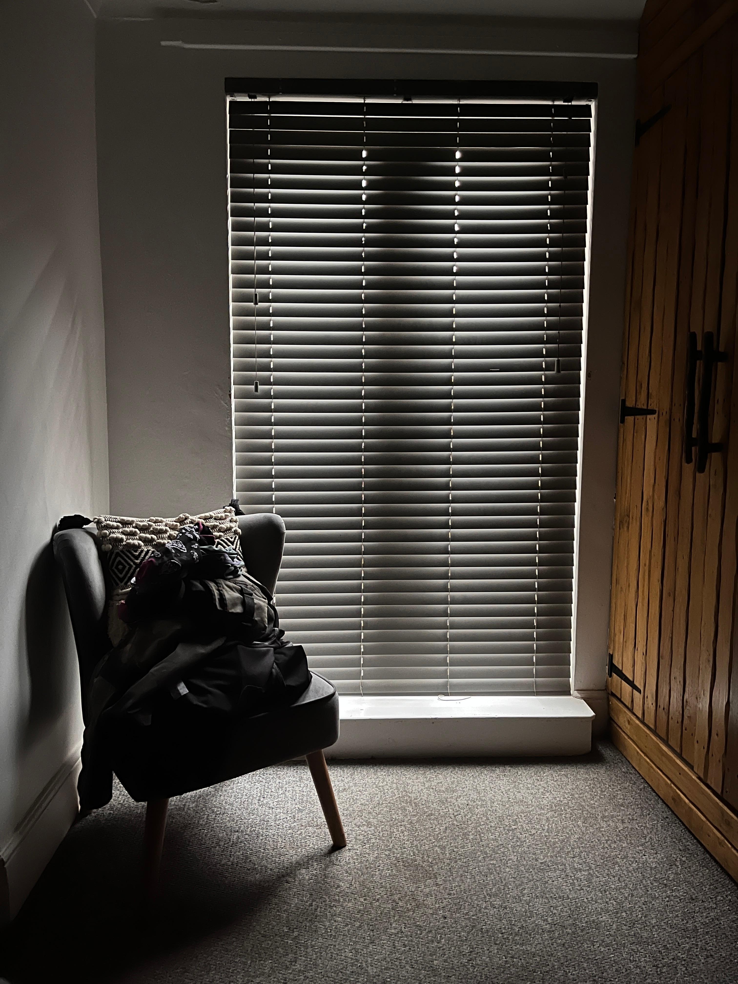 No curtains - room illuminated at daybreak 