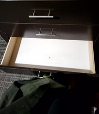 Found dead roach in drawers, roaches were crawling around.