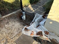 Large hole side of house
