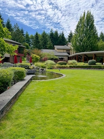 Lovely landscaping beautiful natural lodge property