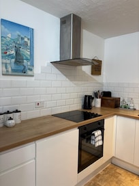 Kitchen - had enough room and was well enough equipped for us to cook quick meals.