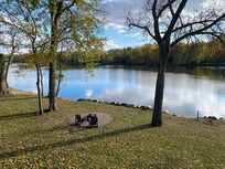 The River in the back yard from the patio deck.