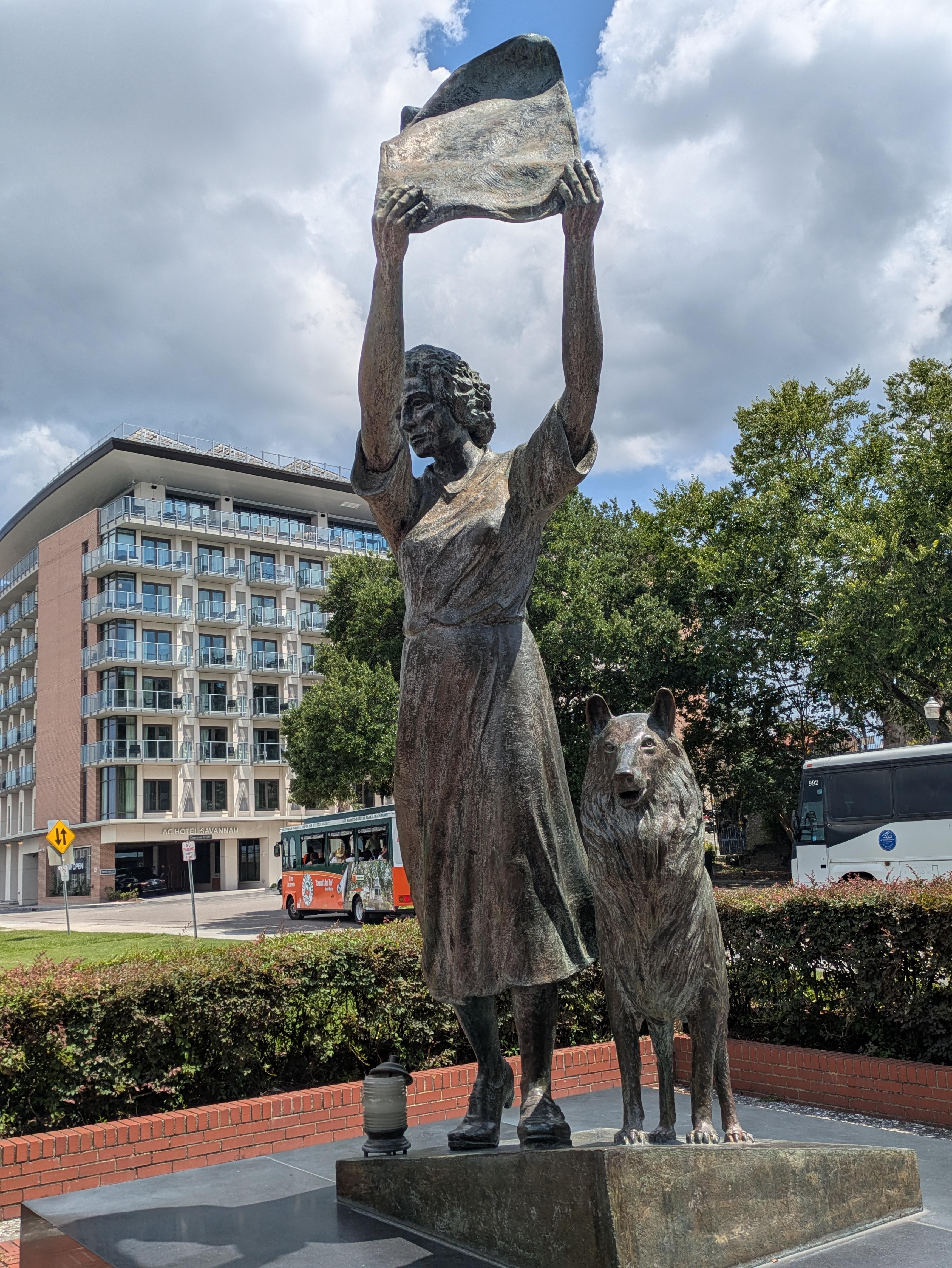 Waterfront statue of waving lady