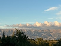 Mountain range along coast to Pag
