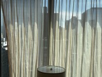 "honey net curtain" reflects the room