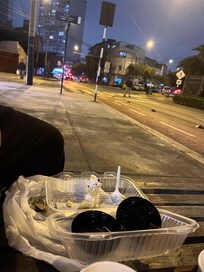 Eating outside the hostel at 10:40pm. Street cameras and constant police presence. Very safe area!