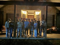 Group picture on the front porch.