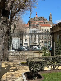 Notre Dame de France and. Cathedral from public Gardens in Le Puy