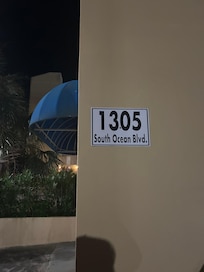The address of the property on the building.