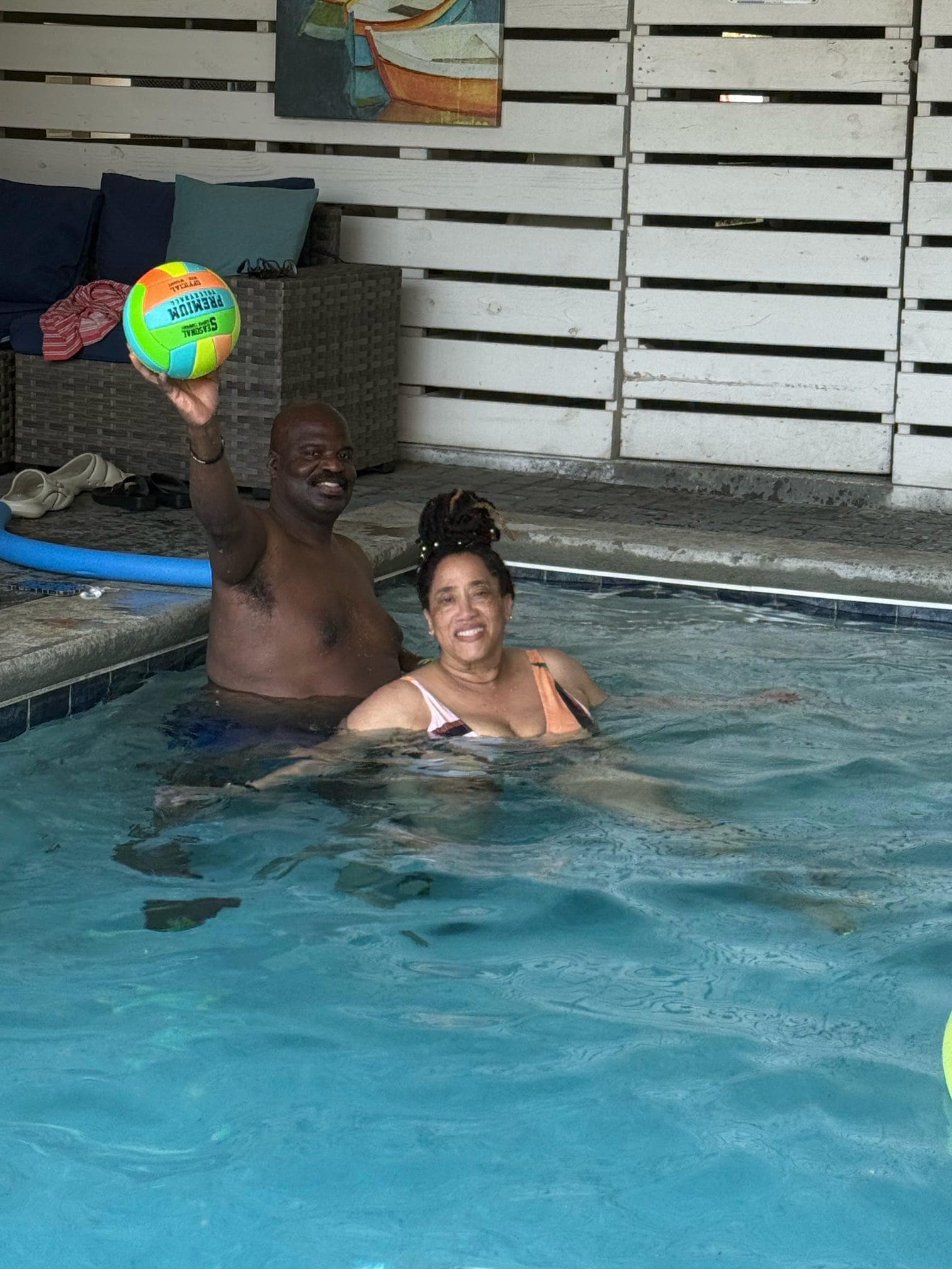 Playing a little volleyball in pool. 