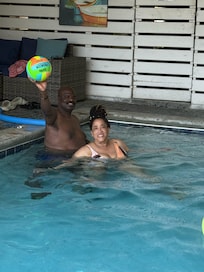 Playing a little volleyball in pool.