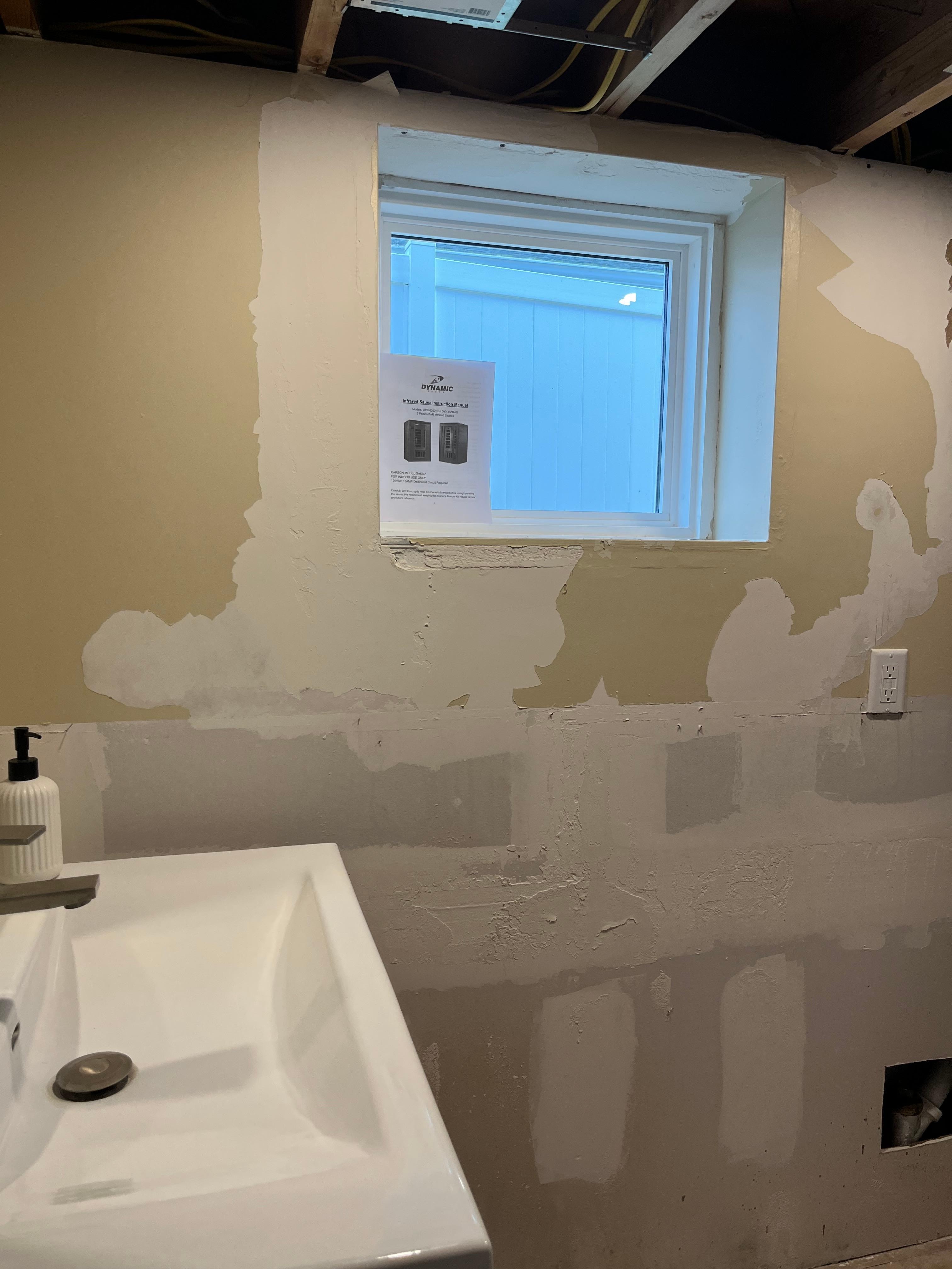 Repair work in basement area where sauna is located