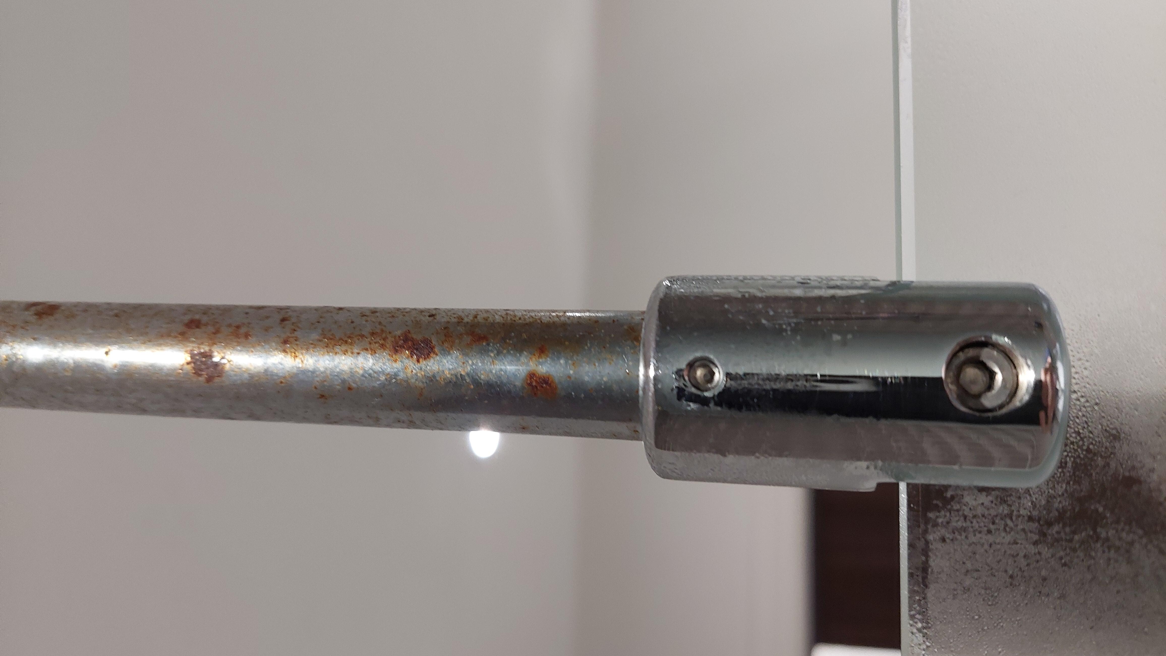 Rust on shower screen ceiling  support bar