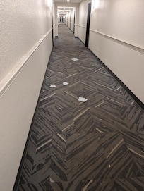 Hallway with trash.