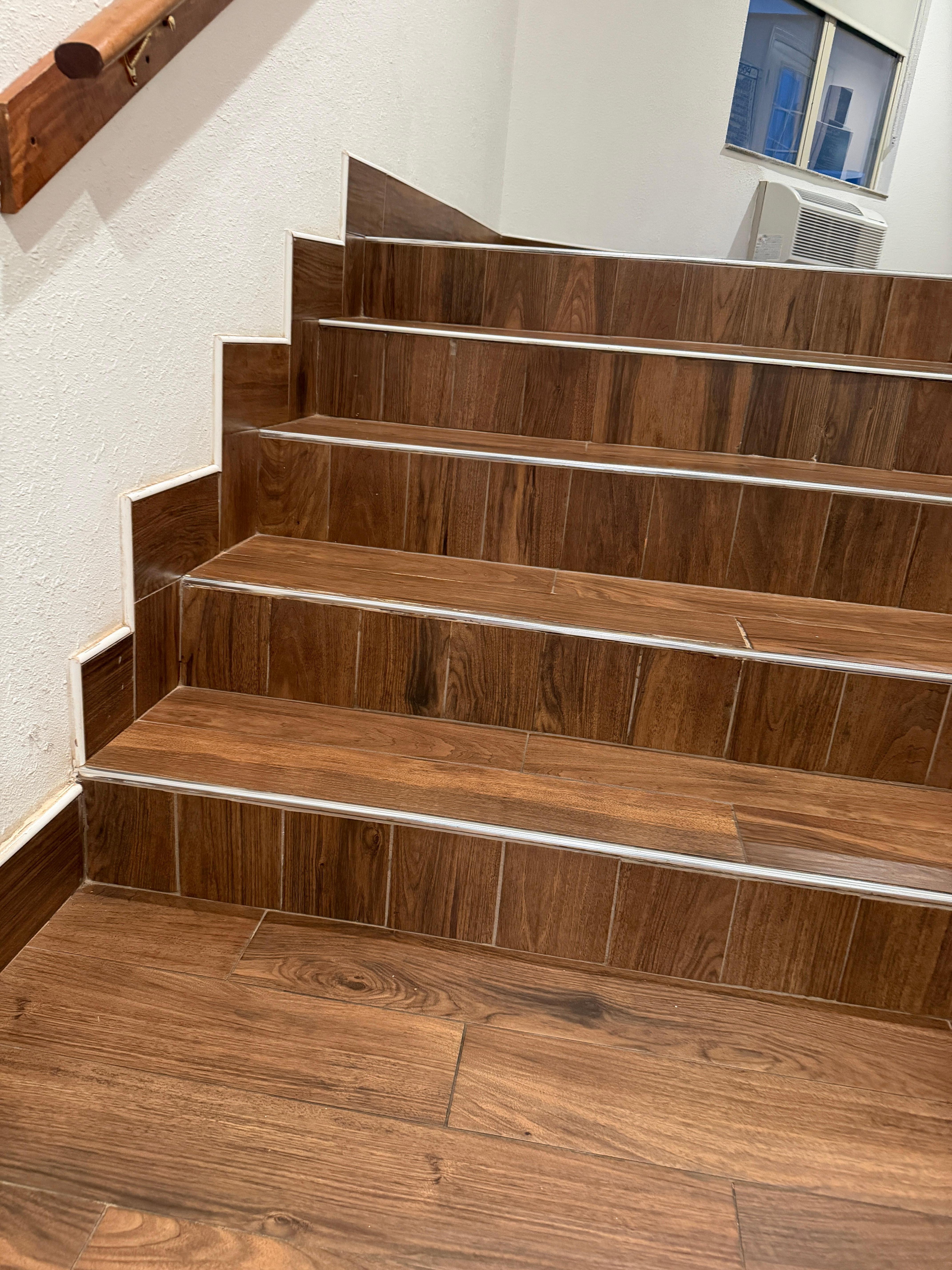 third rise is way too tall. wife tripped and later so did i.  all rises on stairs need to be even and there are codes. 