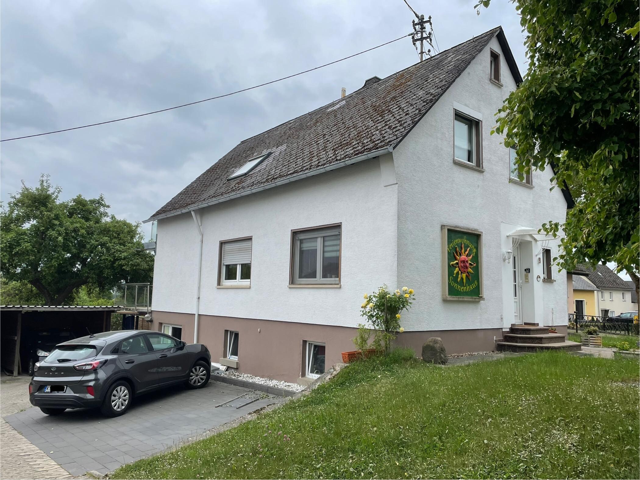 Ferienwohnung Sonnenhaus im Dachgeschoss und Stellplatz
