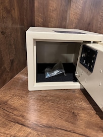 Safe was loose, didn’t work had no batteries.