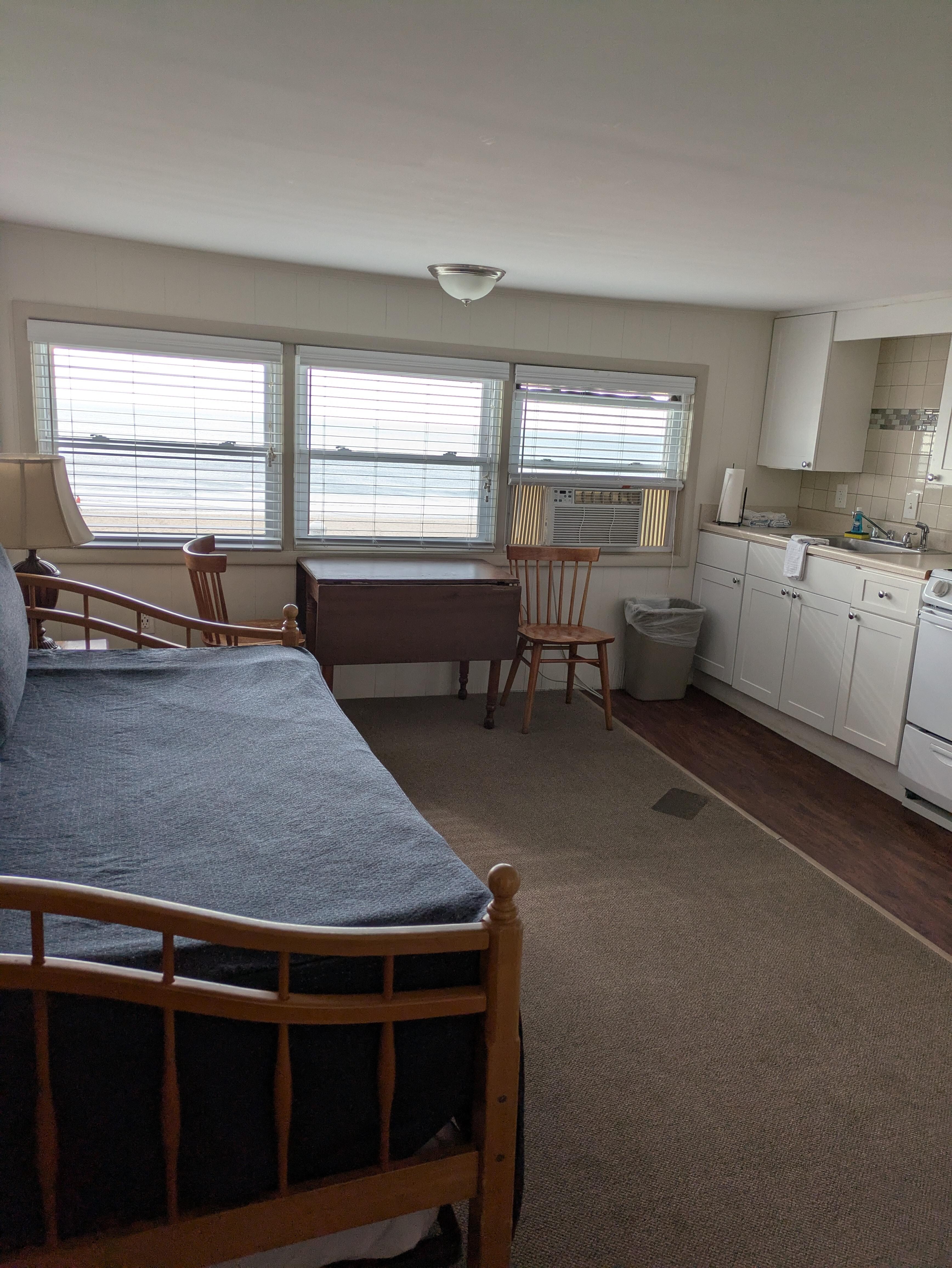 The kitchen/living room has a trundle bed, full size refrigerator, 4-burner stove, and utensils, plates, pans. With the trundle bed the place will sleep 6 comfortably.