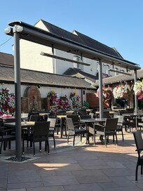 Part of outside courtyard serving food and drinks.