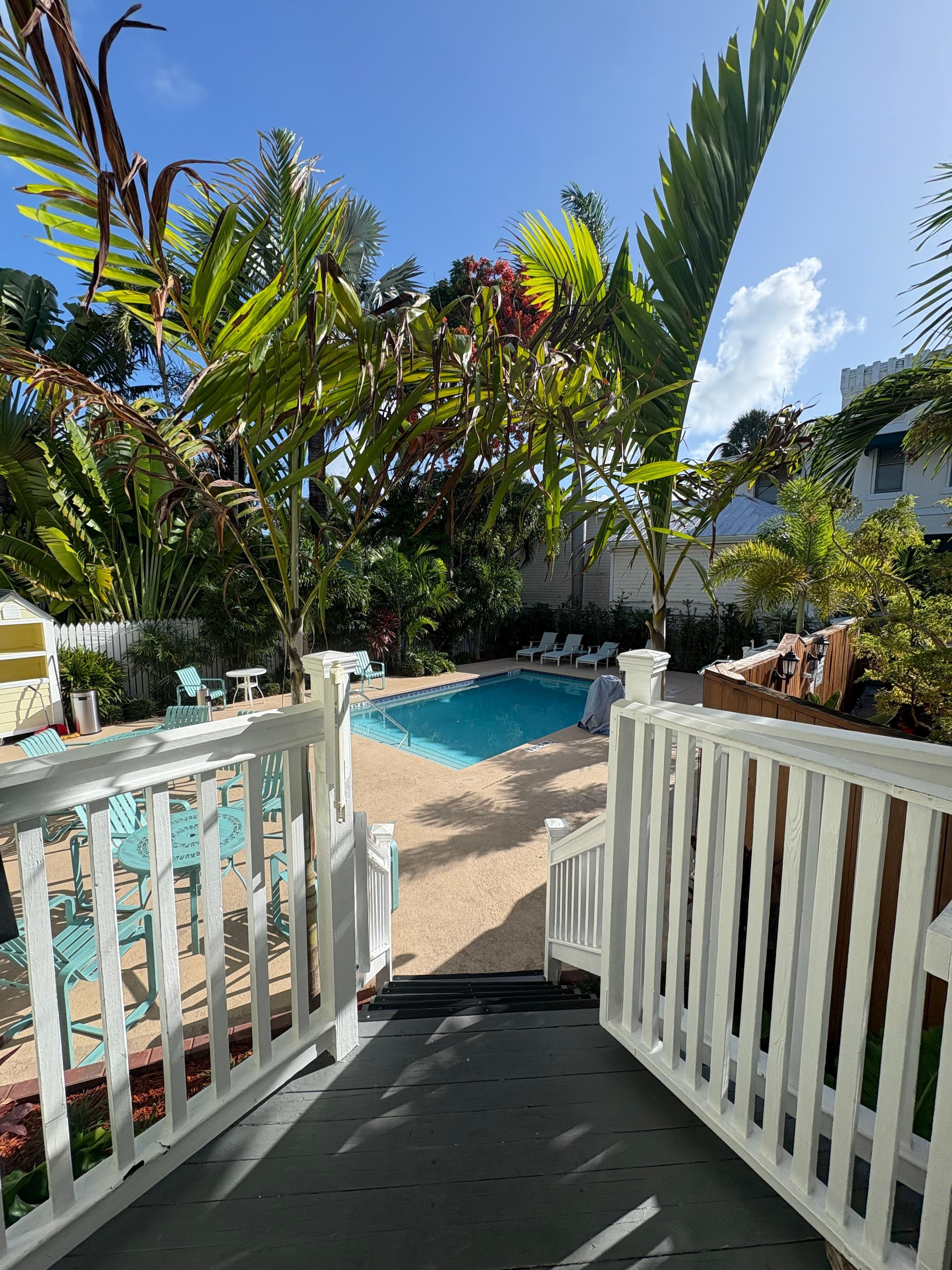 Looking out from the door of our room at the swimming pool area.