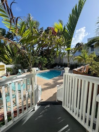 Looking out from the door of our room at the swimming pool area.