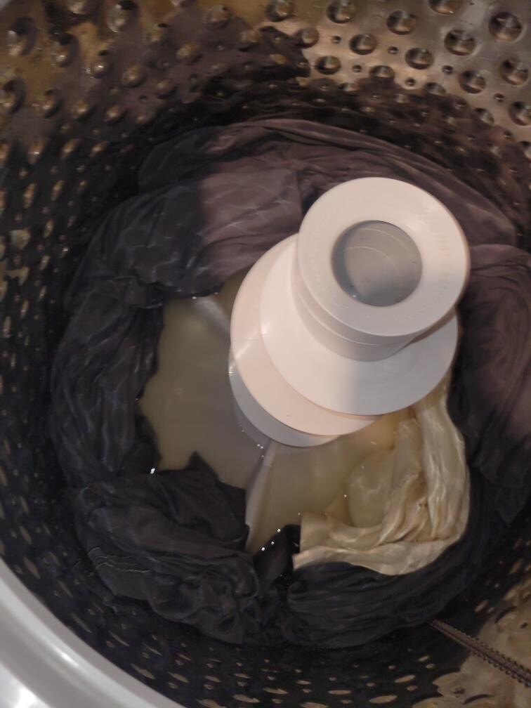 Hard to see, but sewage siphoned into the washer in the basement. The host pumped it out of the washer, but never fixed the issue, which came back 2 days later. 