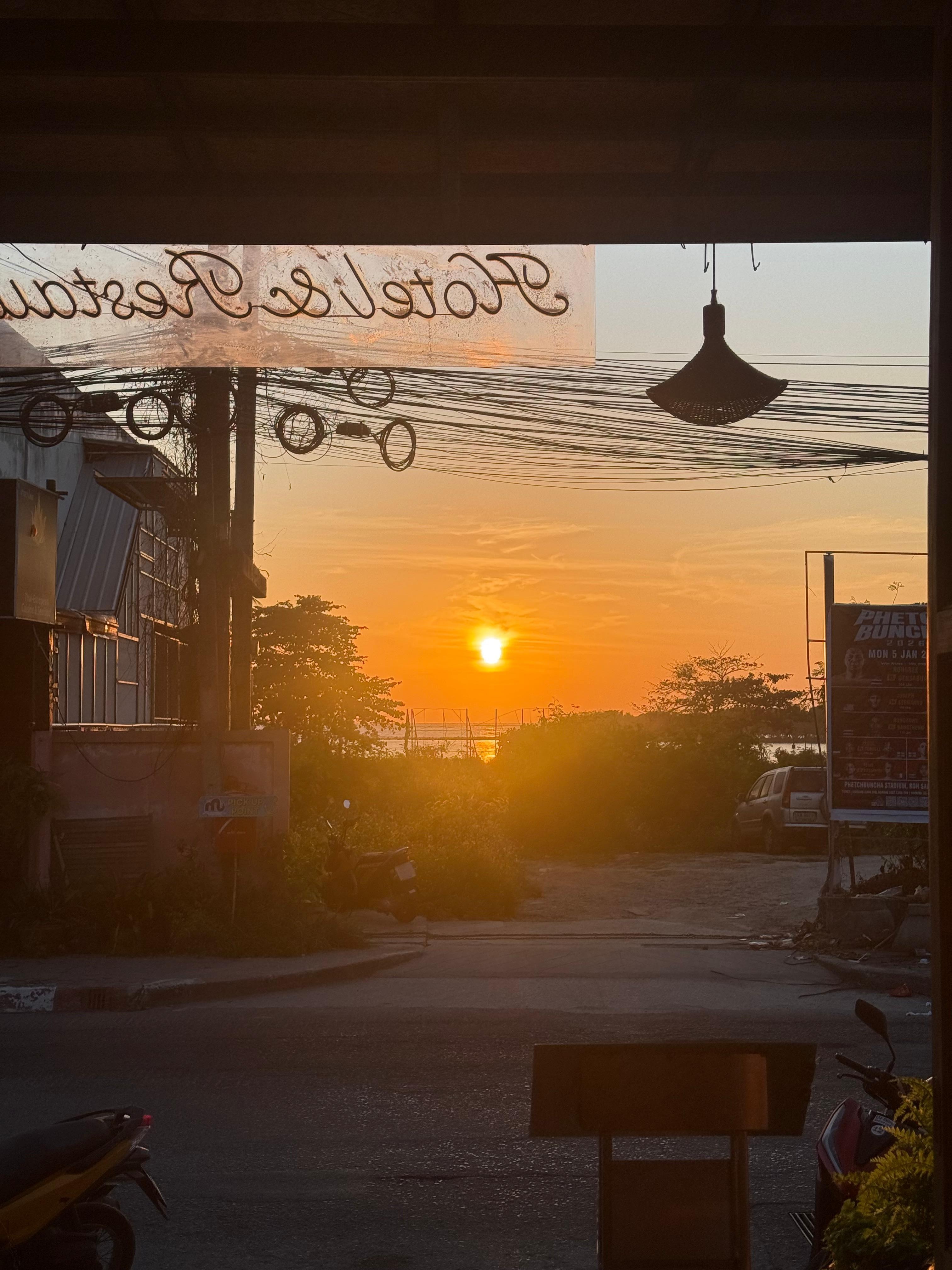 Sunrise from the hotel reception. That is the beach in the background, amazing. 