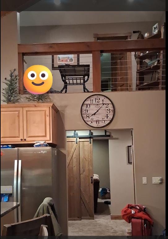 picture taken from balcony doors. left area is kitchen right is fireplace/living room

straight room is game room 

Left back dining area