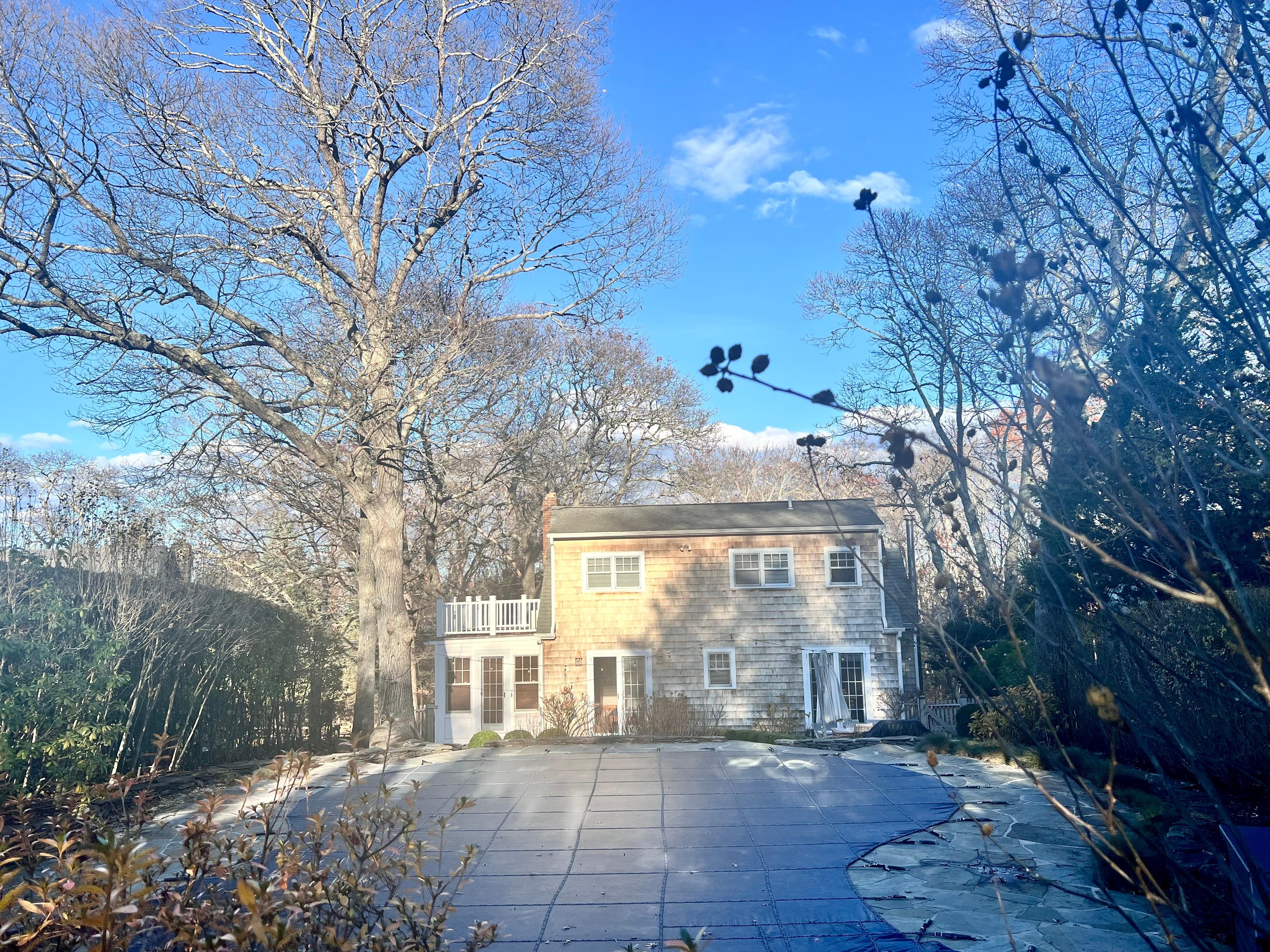 Even in autumn (with the pool closed and covered) the backyard is lovely, peaceful, and serene.  