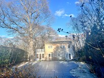 Even in autumn (with the pool closed and covered) the backyard is lovely, peaceful, and serene.