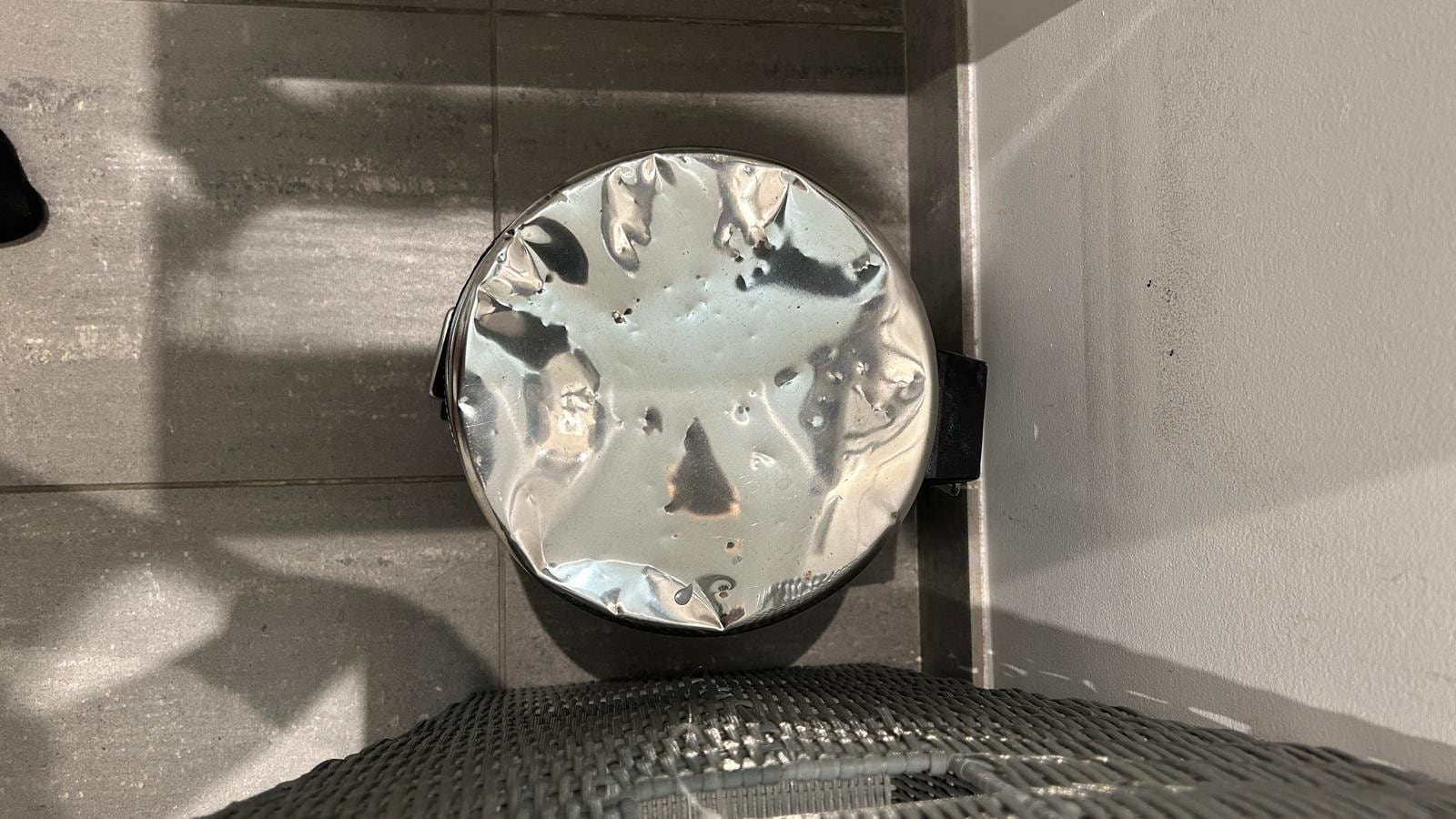 Destroyed Garbage Tin