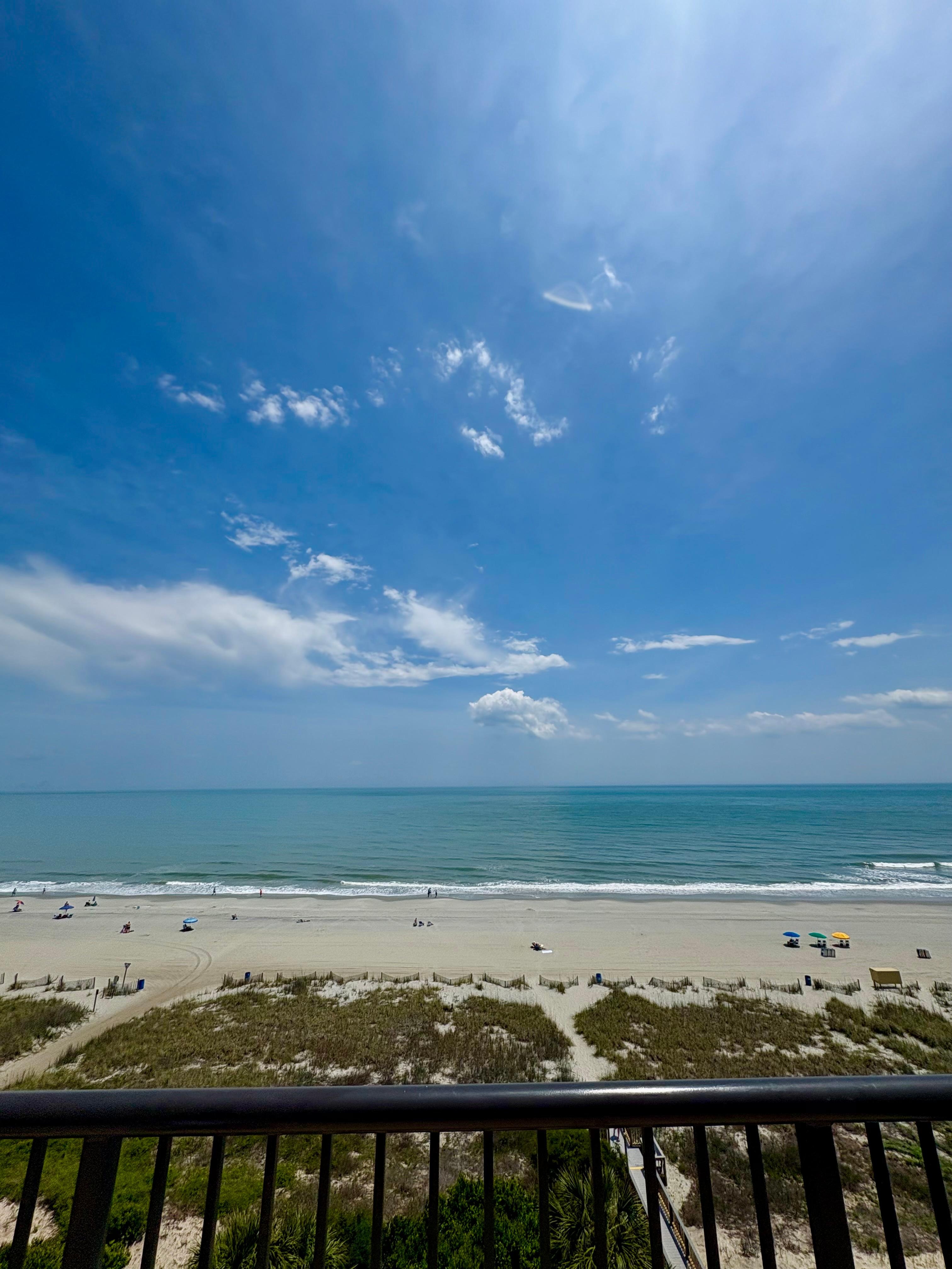 View from back deck of condo to the beautiful beach 