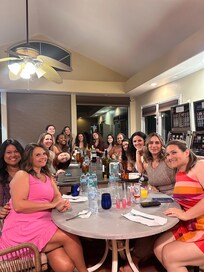 Moving tables so we could all sit together for dinner