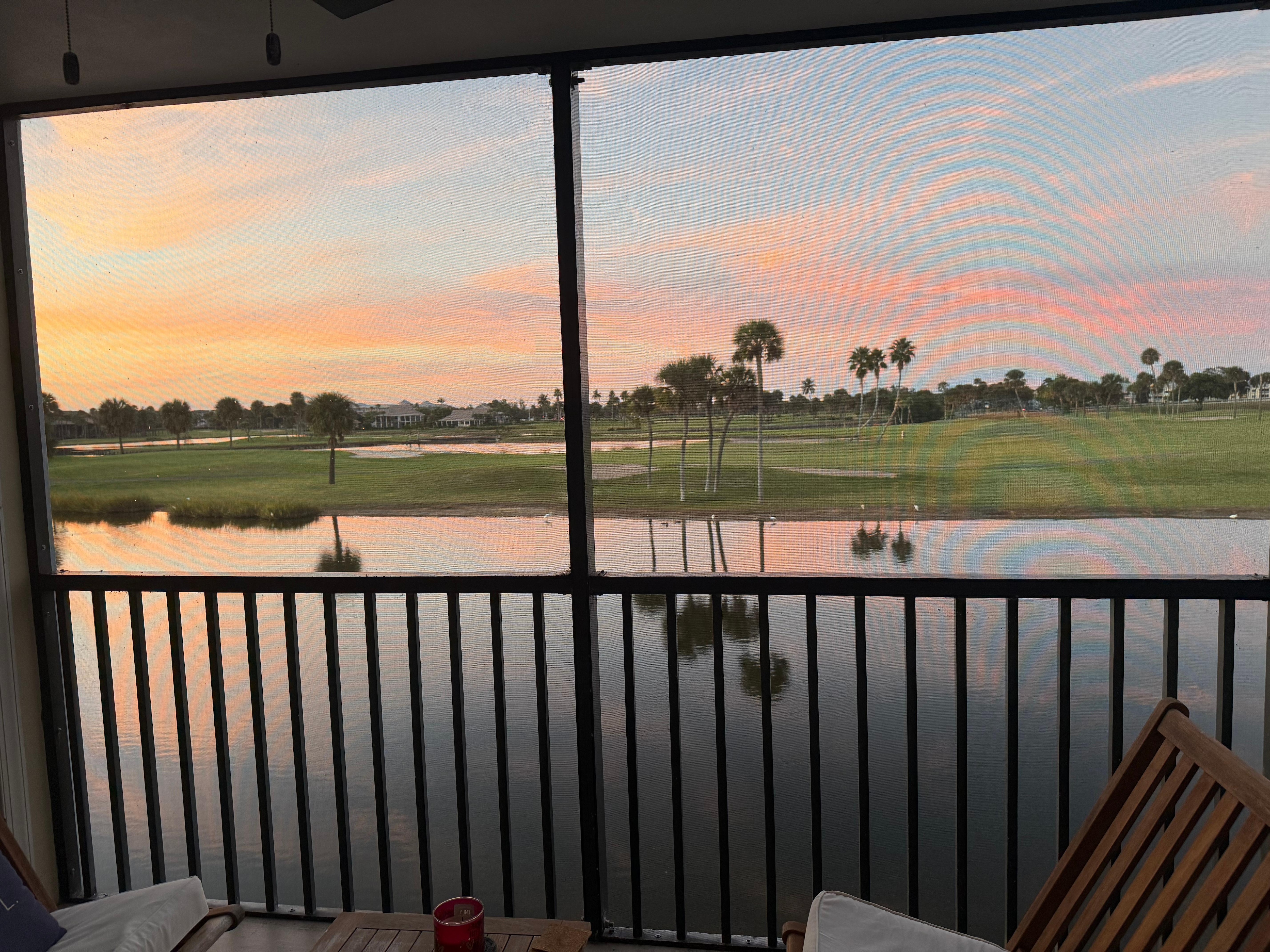 Gorgeous sunsets on the screened-in balcony 