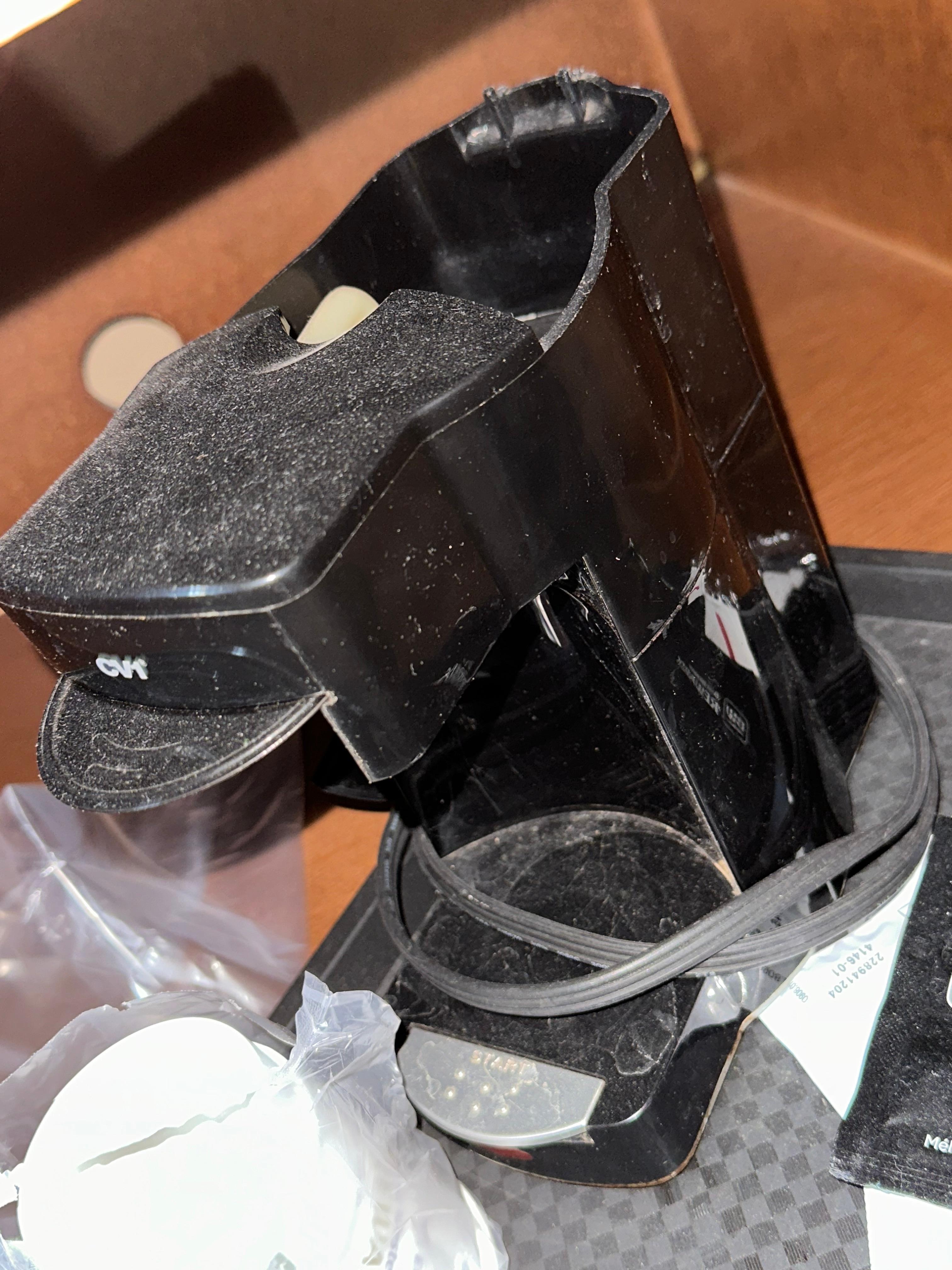 Dusty coffee pot. Shows the room has not been cleaned. 