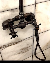Broken shower head and faucet. It is also disgustingly filthy. It leaks and drips nonstop. Along with being rusted. Also no hot water came out of this broken shower for our entire stay!