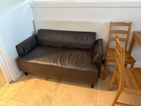 The only lounge for 4 adults. And the uncomfortable chairs