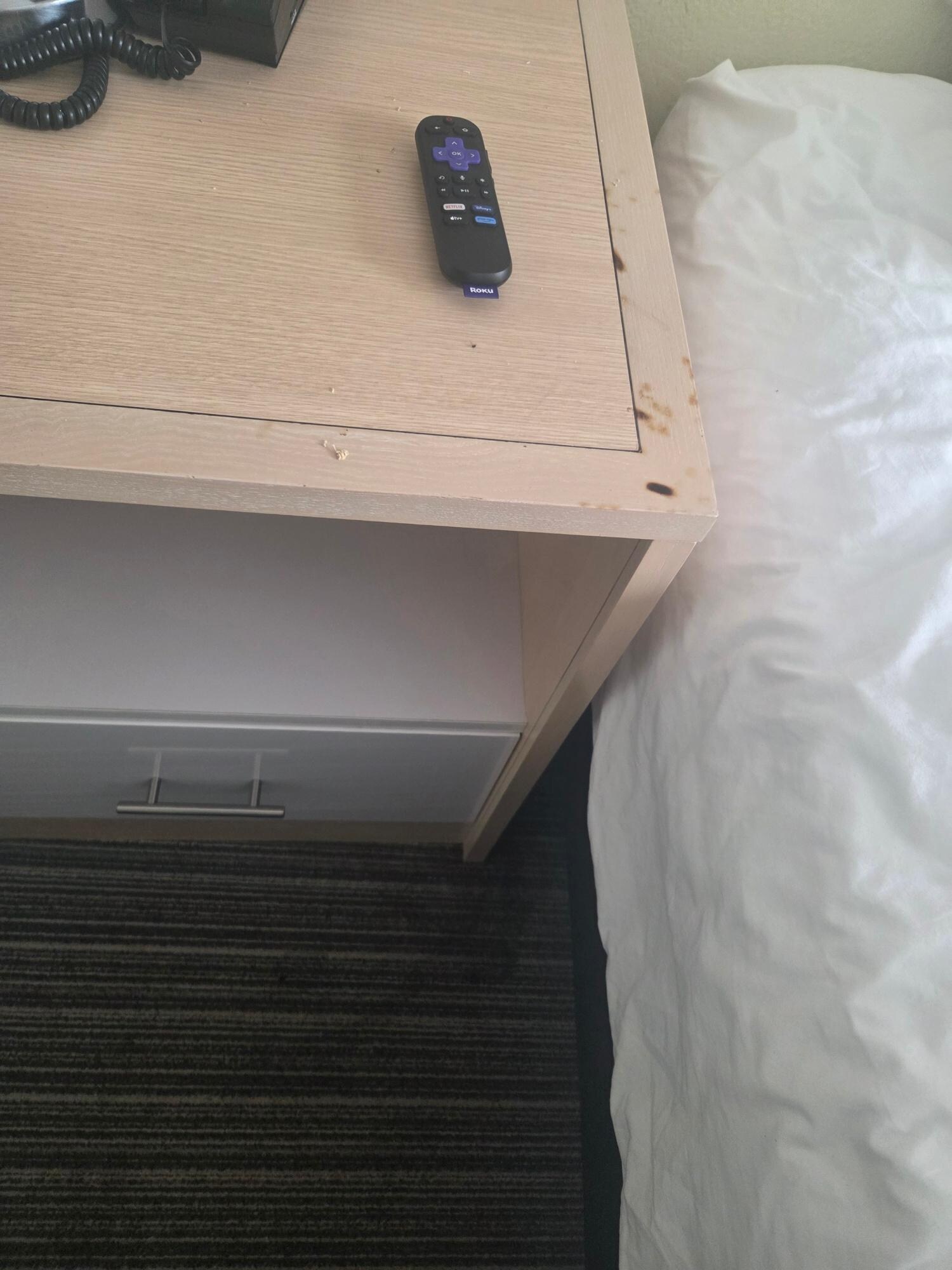 Burn marks on end table