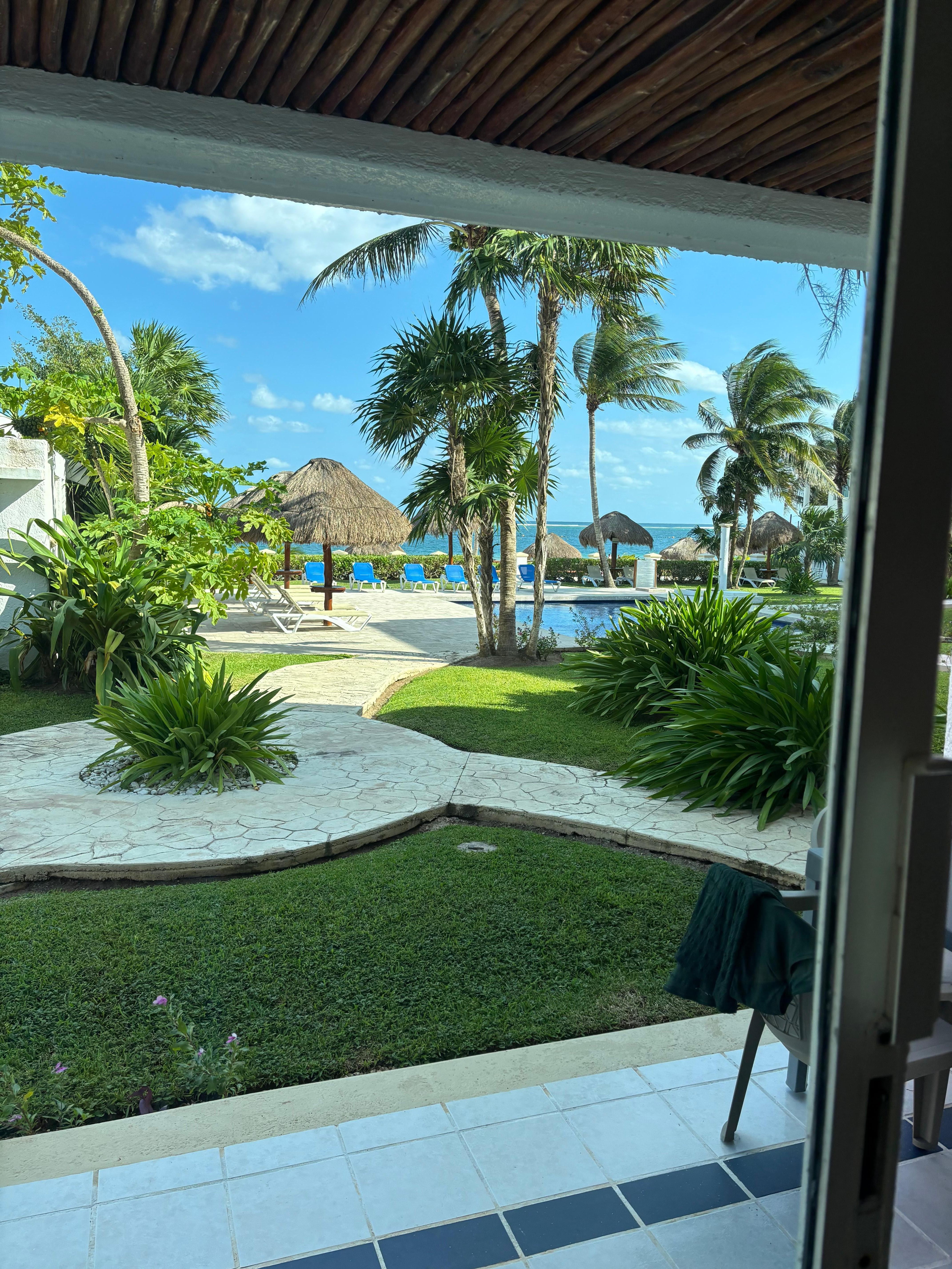 View across the pool towards the beach
