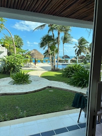 View across the pool towards the beach