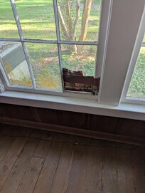Duct tape holding a window together