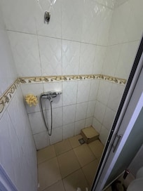 Bathroom with shower head not mounted